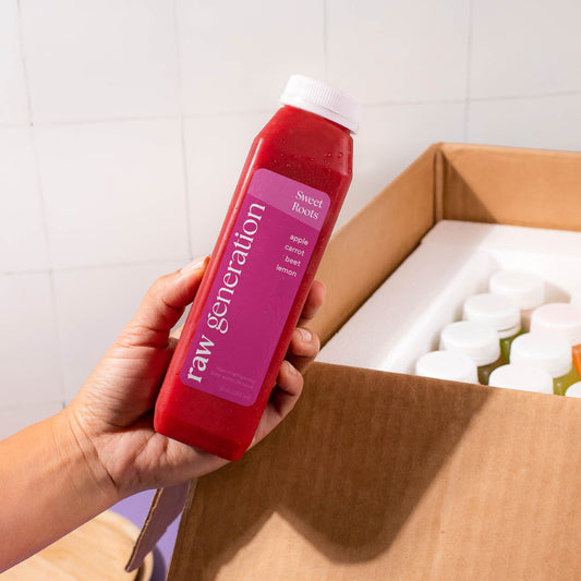 Sweet Roots in front of a cleanse box