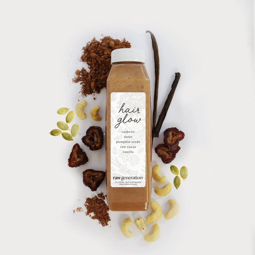 Bridal Hair Glow smoothie bottle with cashews, dates, pumpkin seeds, raw cacao, vanilla beans; a protein-rich, meal-replacement drink by Raw Generation.