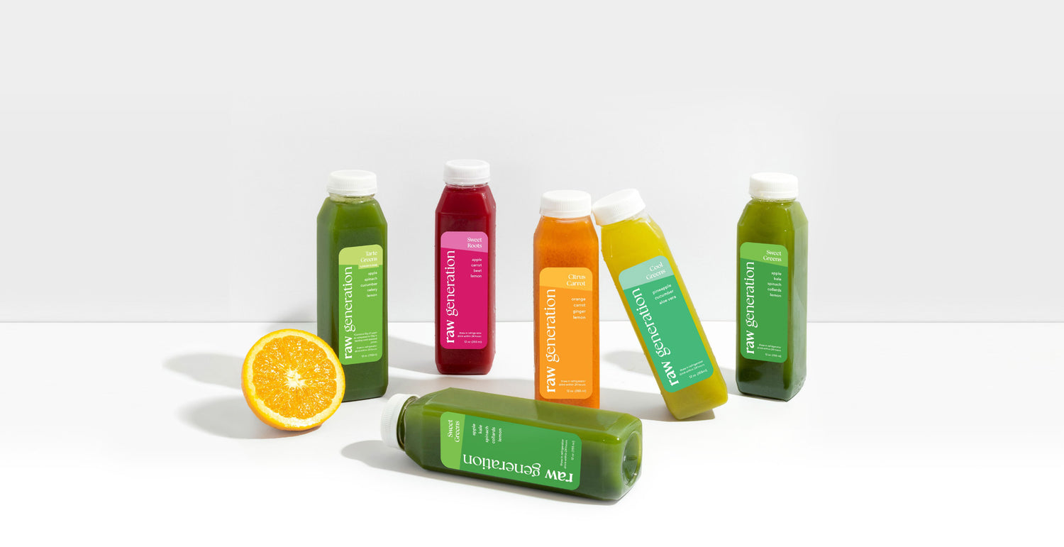 Raw Generation juice lineup with an orange cut in half