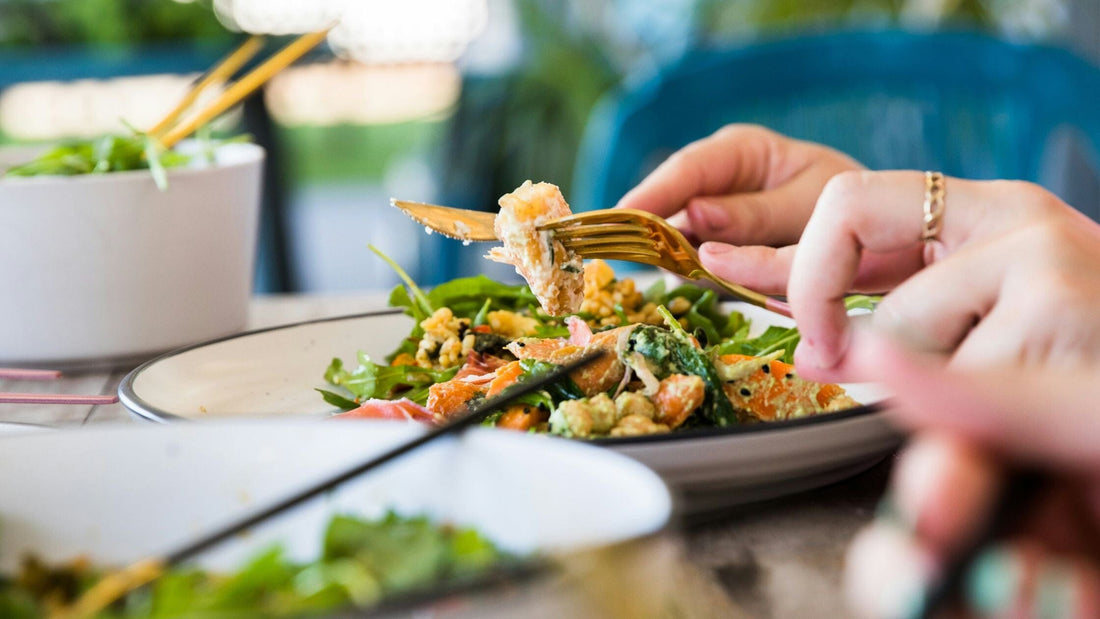Fork and knife cutting food