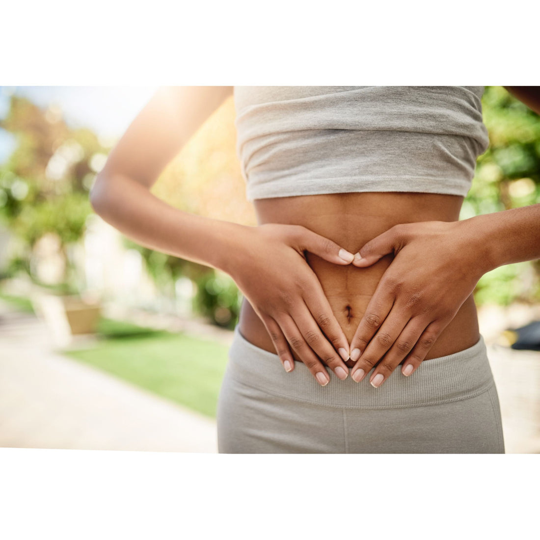 Woman with hand son stomach