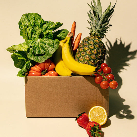 fruit and veggies in a box