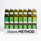 Detox Method kit with 20 bottles of assorted green juices, featuring blends like Strawberry Greens, Citrus Mint, and Tropical Greens for a multi-day cleanse.
