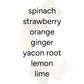 Detox Juice bottle with visible ingredients: spinach, strawberry, orange, ginger, yacon root, lemon, and lime, emphasizing its sweet, tangy flavor and 8g protein content.