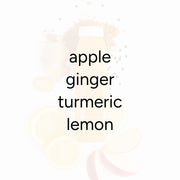 Ginger Turmeric juice bottle with apple, ginger, turmeric, and lemon slices around it, promoting immune support with added black pepper.