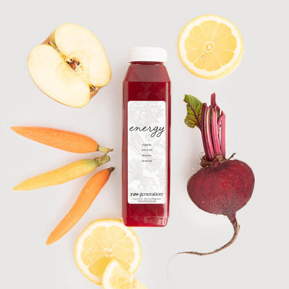 Bridal Energy juice bottle with apples, carrots, beets, and lemons, highlighting its nutrient-rich blend for vitality and wellness.