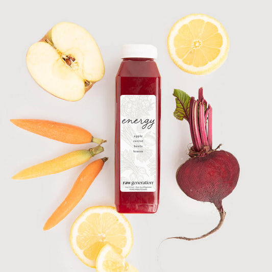 Bridal Energy juice bottle with apples, carrots, beets, and lemons, highlighting its nutrient-rich blend for vitality and wellness.