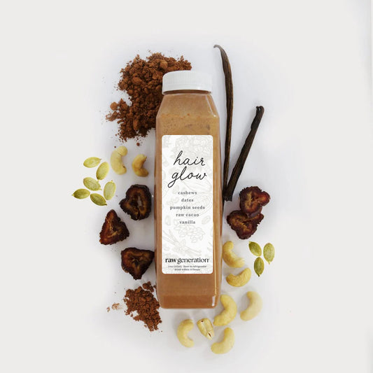 Bridal Hair Glow smoothie bottle with cashews, dates, pumpkin seeds, raw cacao, vanilla beans; a protein-rich, meal-replacement drink by Raw Generation.