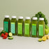 Daily Detox Box featuring six bottles of green juice by raw generation, surrounded by fresh produce, supports cleansing, reduces cravings, boosts energy, and enhances immune health.