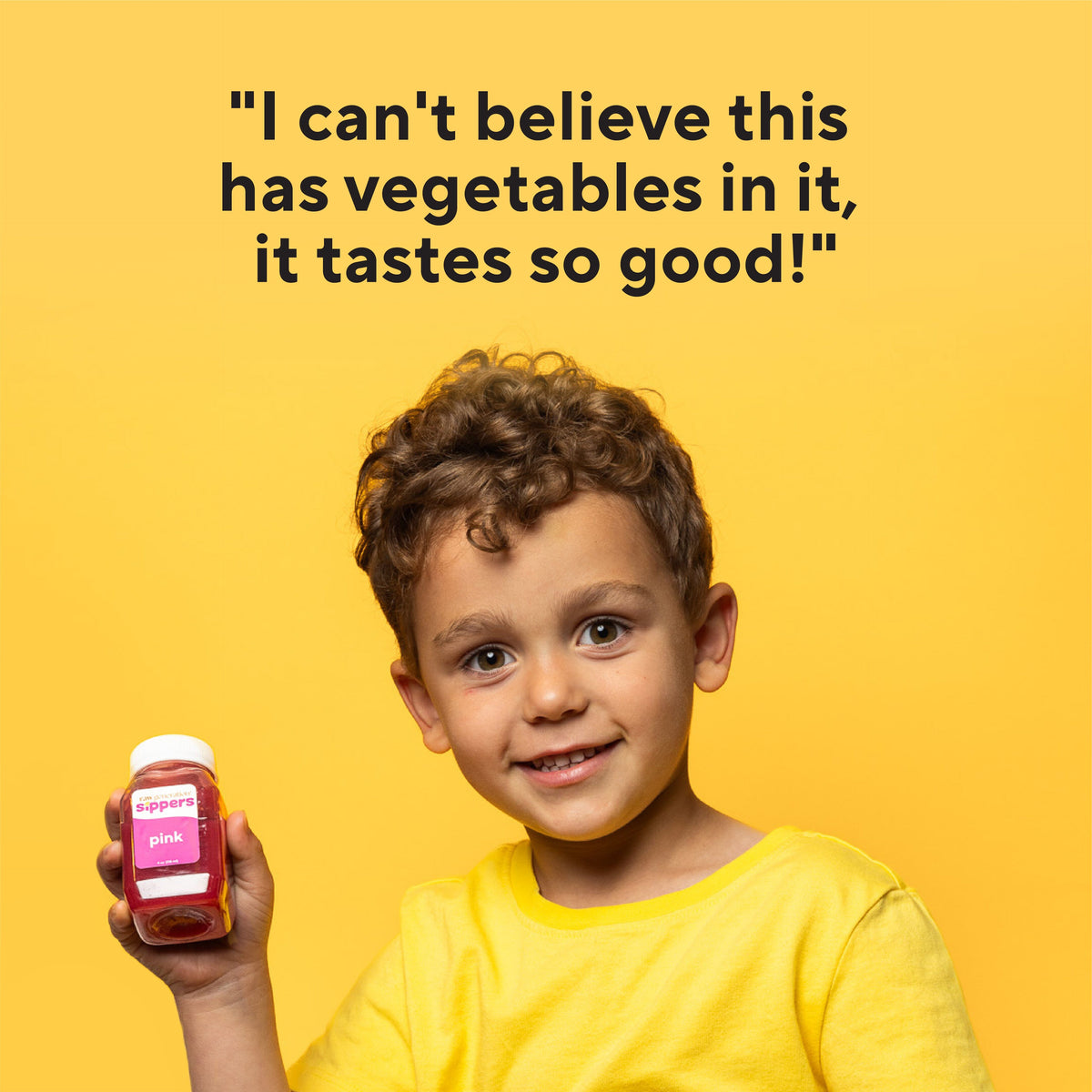Child holding a jar labeled Sippers for Kids, showcasing a healthy drink with 40 fruits and vegetables, designed to improve children's nutrition.