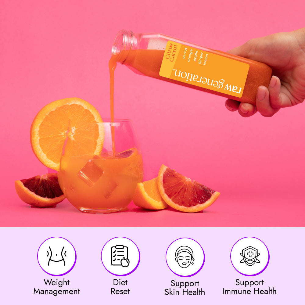 Citrus Carrot cold-pressed juice being poured into an ice-filled glass, surrounded by orange slices, with icons highlighting weight management, diet reset, and skin and immune health support.