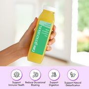 Hand holding a bottle of Raw Generation Cool Greens juice with apple, pineapple, cucumber, and lime, highlighting immune support, digestive wellness, and daily detox benefits.