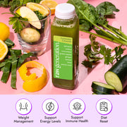 Lemony Greens Juice bottle by Raw Generation on a pink surface, surrounded by spinach, cucumber, lemon, and herbs, highlighting weight management support and immune health benefits.
