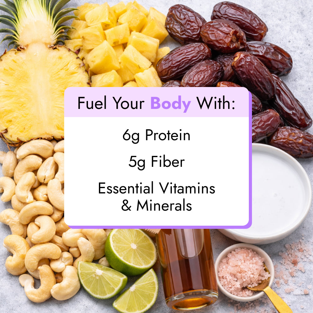 Piña Colada Smoothie ingredients in a flat-lay: pineapple, dates, cashews, lime, honey, yogurt, Himalayan salt. Boosts with protein, fiber, vitamins, and minerals.