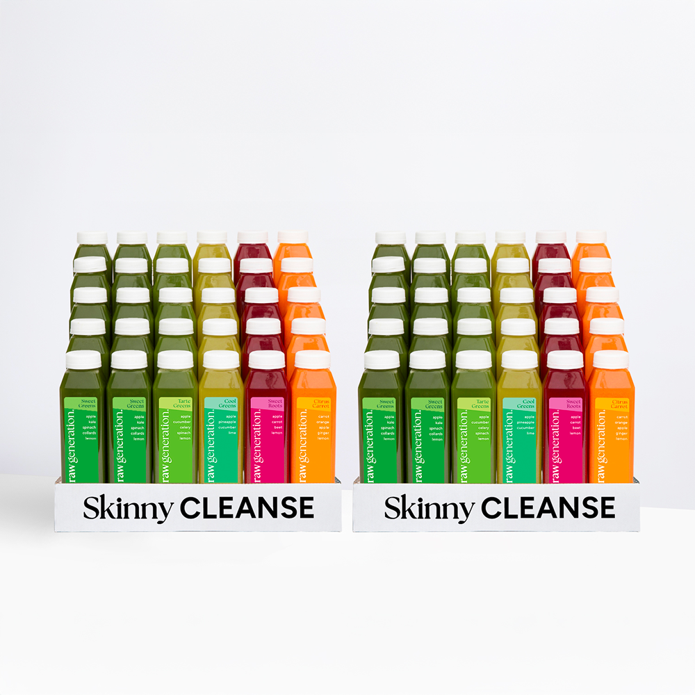 Cleanse for 2: Two trays of bottled cold-pressed juices labeled Skinny CLEANSE, ideal for a shared 5-day detox to boost energy and reset diet.