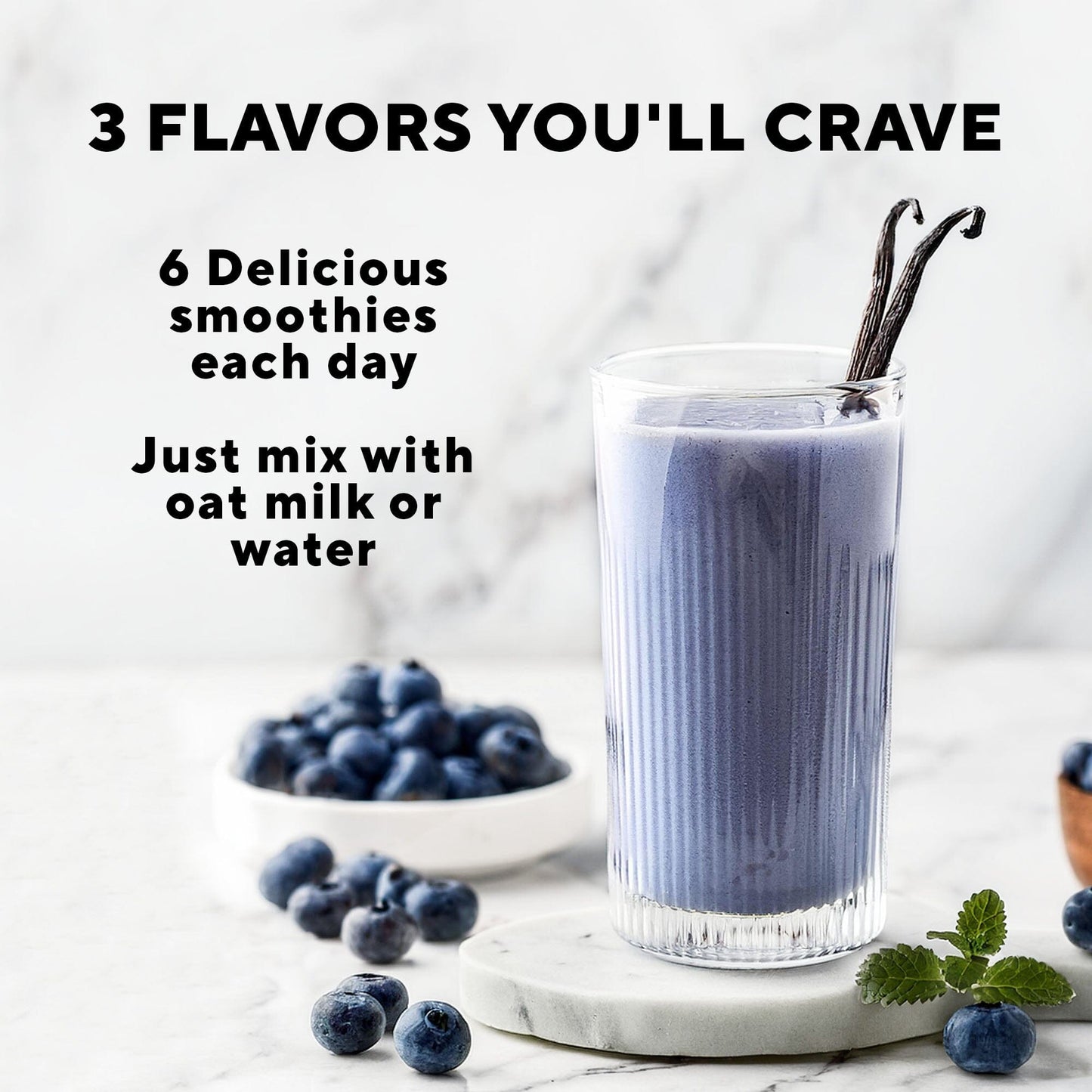 Instant Smoothie Detox Cleanse: A glass of blue liquid with two straws, placed in front of a bowl of blueberries, showcasing a nutritious detox option.