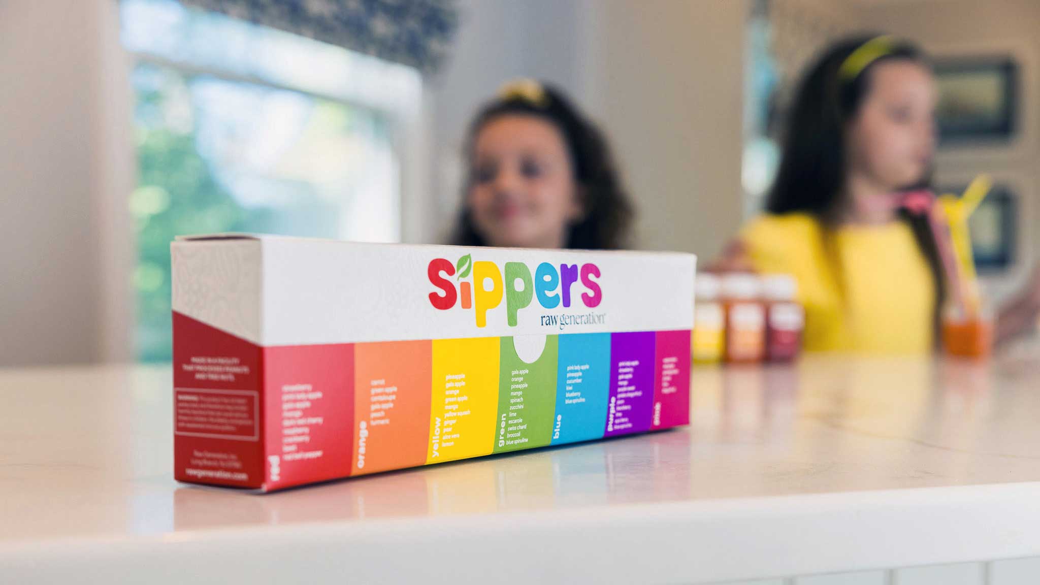 Sipper juice box with kids in background