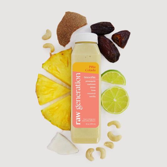A Raw Generation Piña Colada Smoothie bottle is shown with pineapple slices, coconut pieces, cashews, dates, and lime slices on a white background. The label emphasizes all-natural ingredients including pineapple and vanilla, with no added sugar.