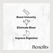 Cool Greens product image featuring black text on a white marble background, highlighting benefits like faster healing and healthier teeth with aloe vera and fresh ingredients.