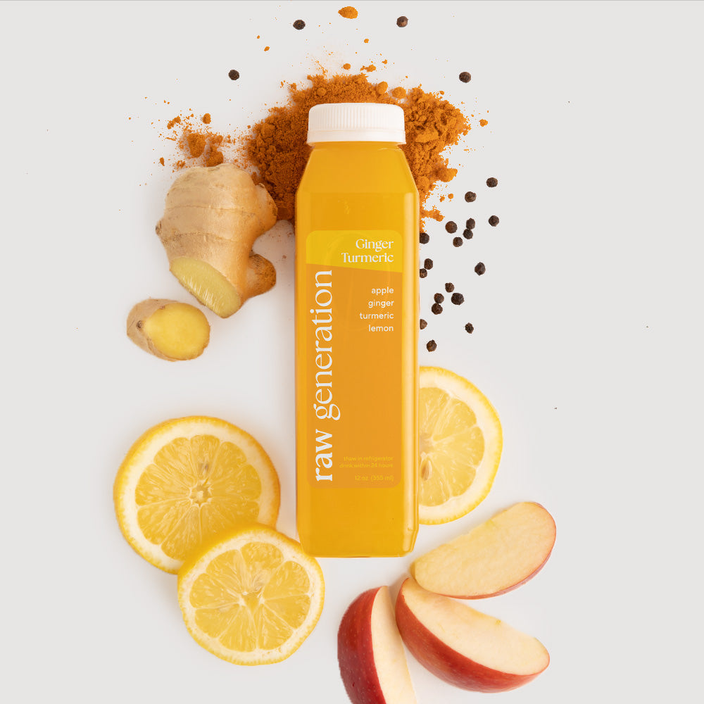 Ginger Turmeric juice bottle surrounded by lemon slices, apple, and ginger, highlighting its immune-boosting ingredients and Vitamin C-rich composition.